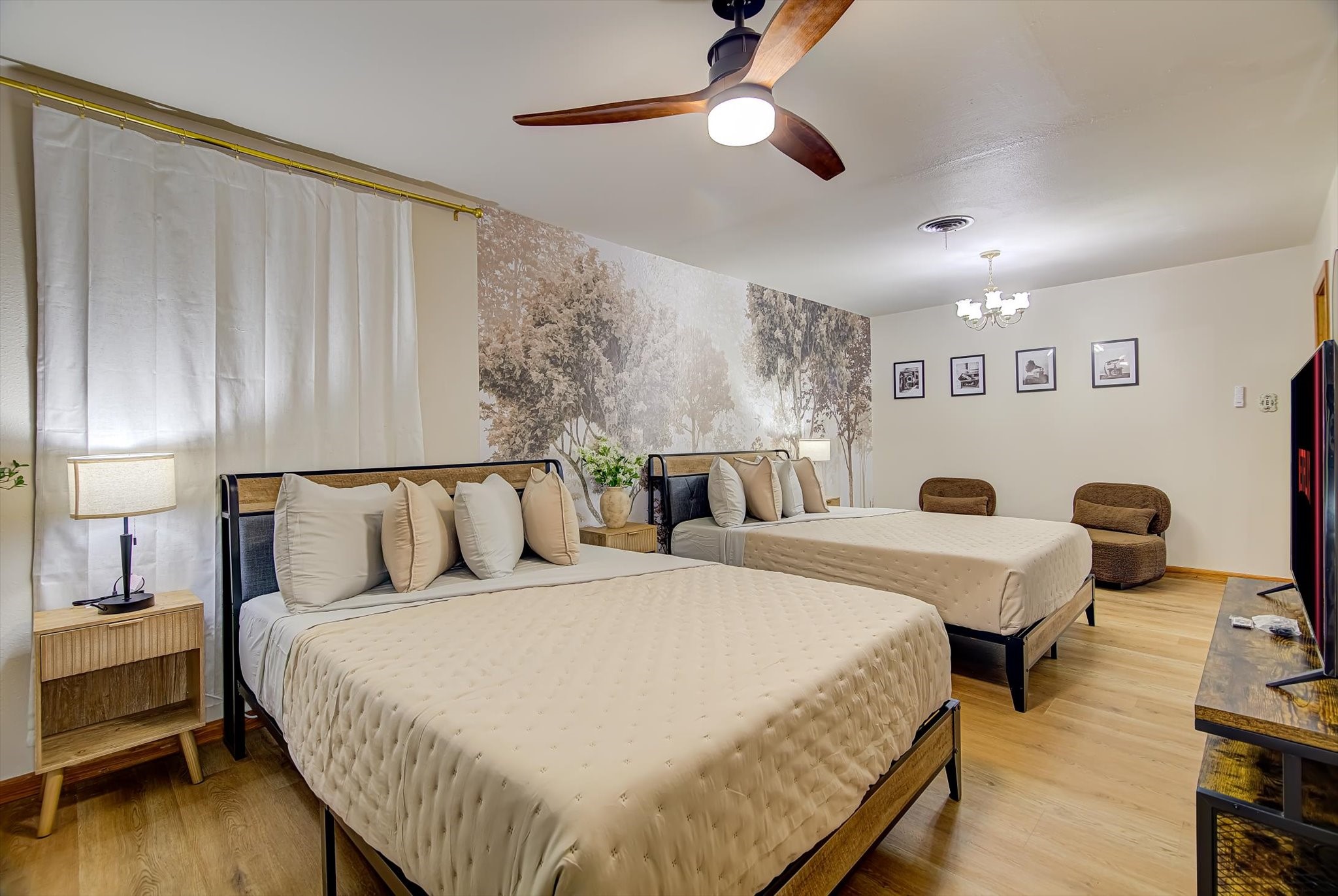 9825 Radio Road Houston, TX 77075 - Photo 21 of 50 a bed room with a bed and a chandelier