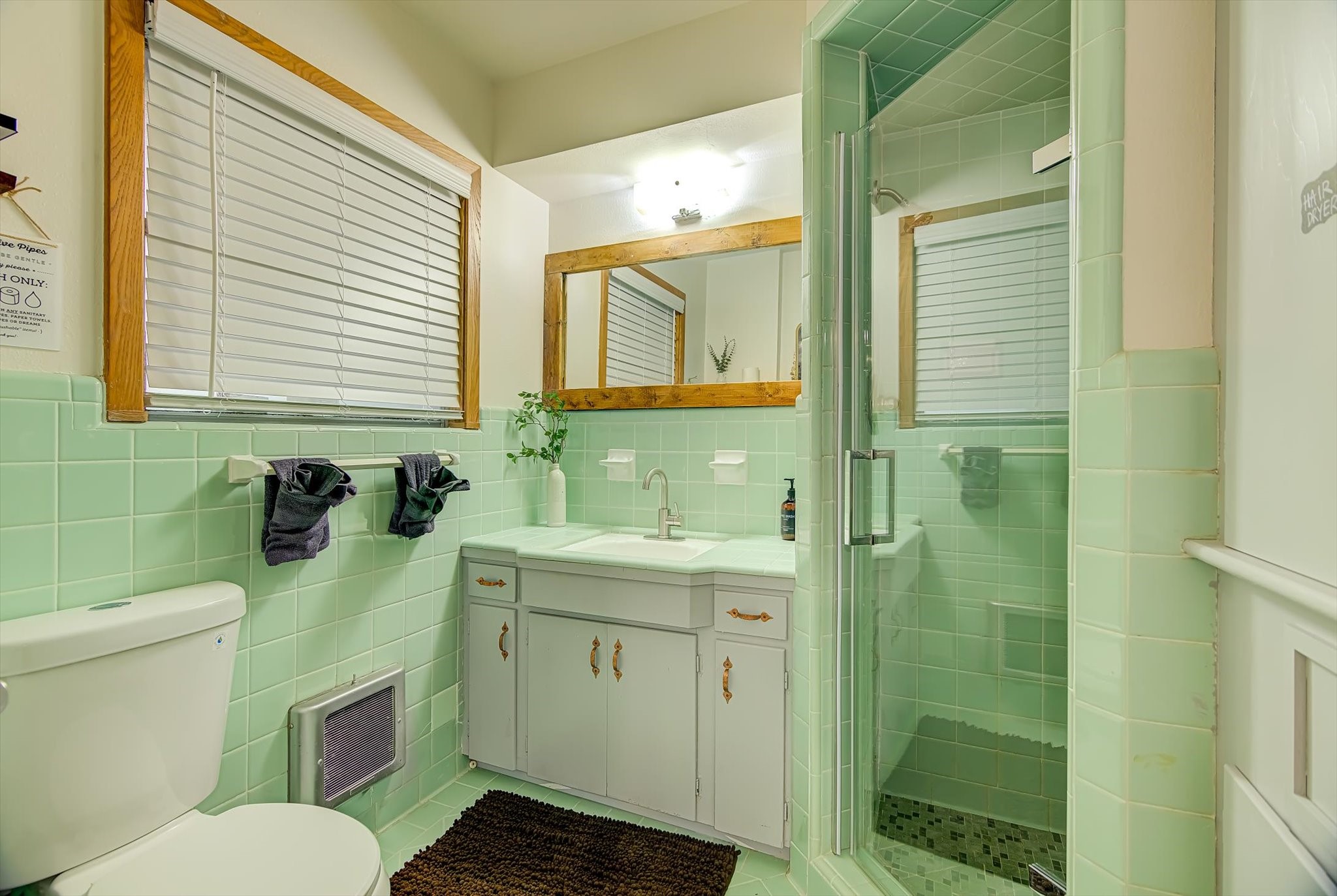 9825 Radio Road Houston, TX 77075 - Photo 24 of 50 a bathroom with a sink a toilet and shower