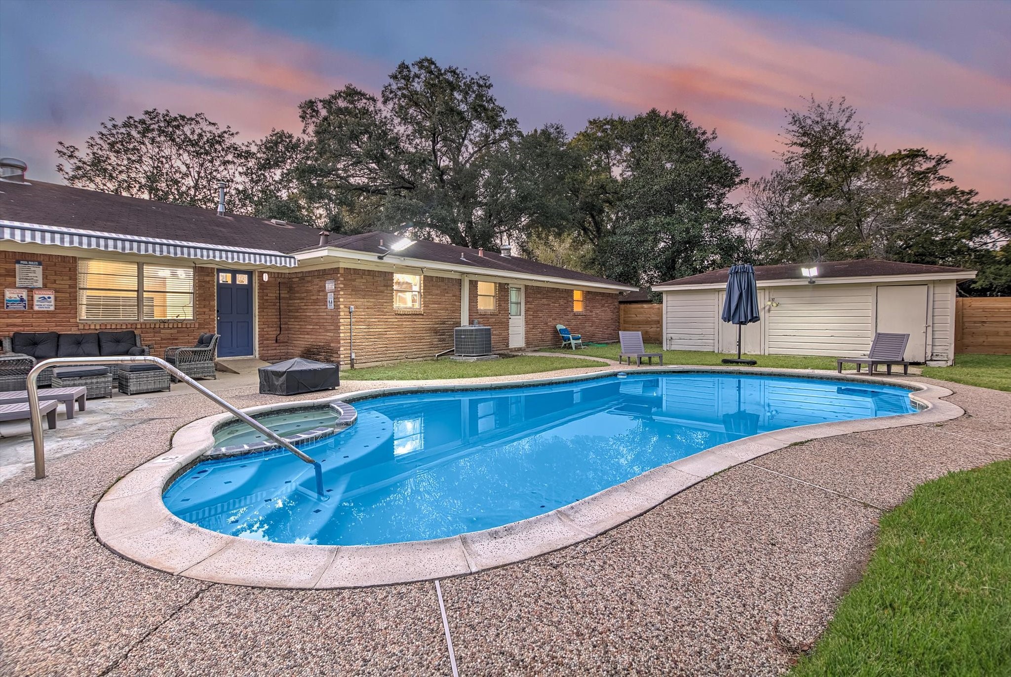 9825 Radio Road Houston, TX 77075 - Photo 34 of 50 a view of a swimming pool with chairs