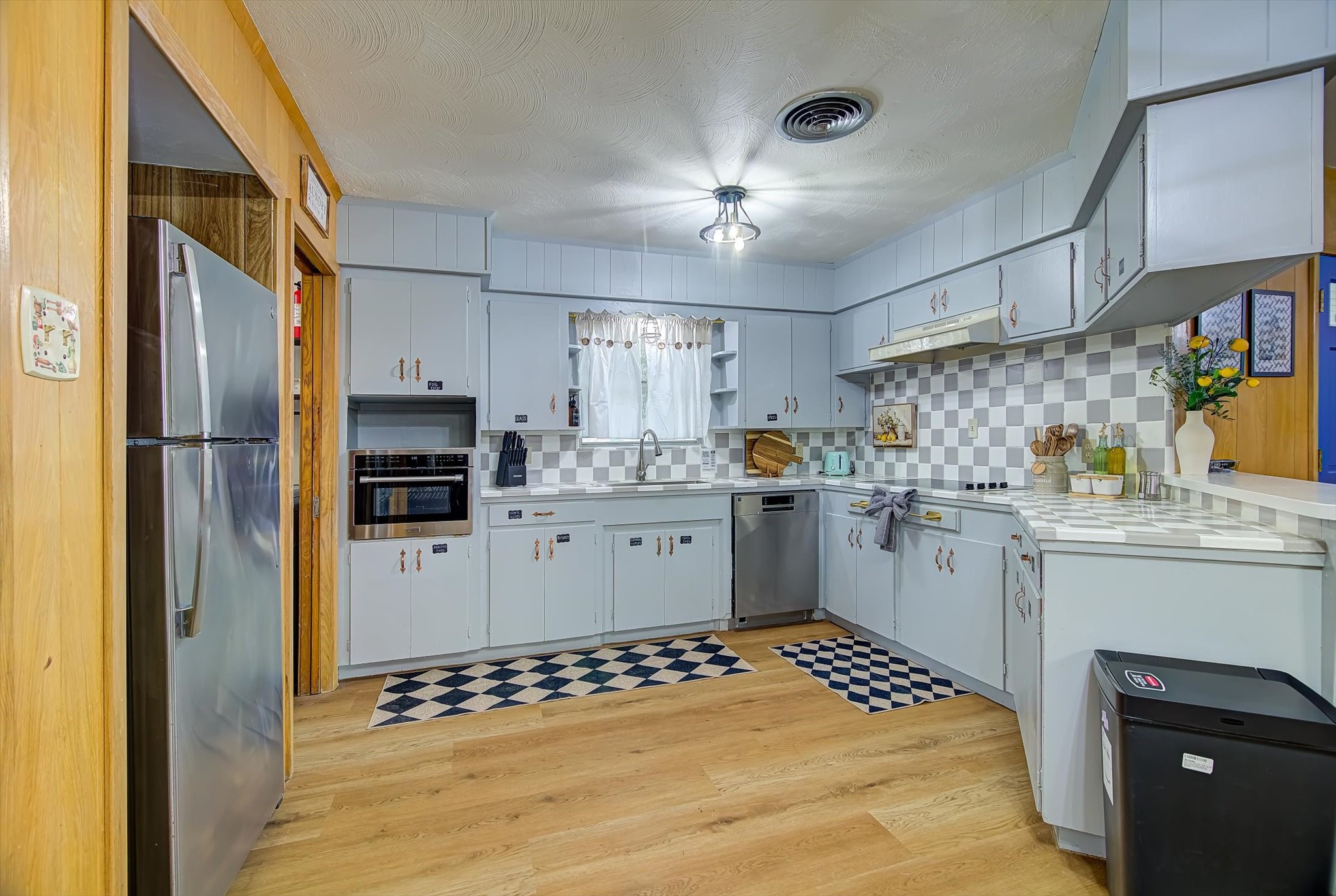 9825 Radio Road Houston, TX 77075 - Photo 5 of 50 a kitchen with granite countertop stainless steel appliances a sink and counter space