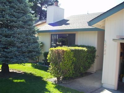 4750 Sunshine Avenue Santa Rosa, CA 95409 - Photo 2 of 12 a front view of a house with garden