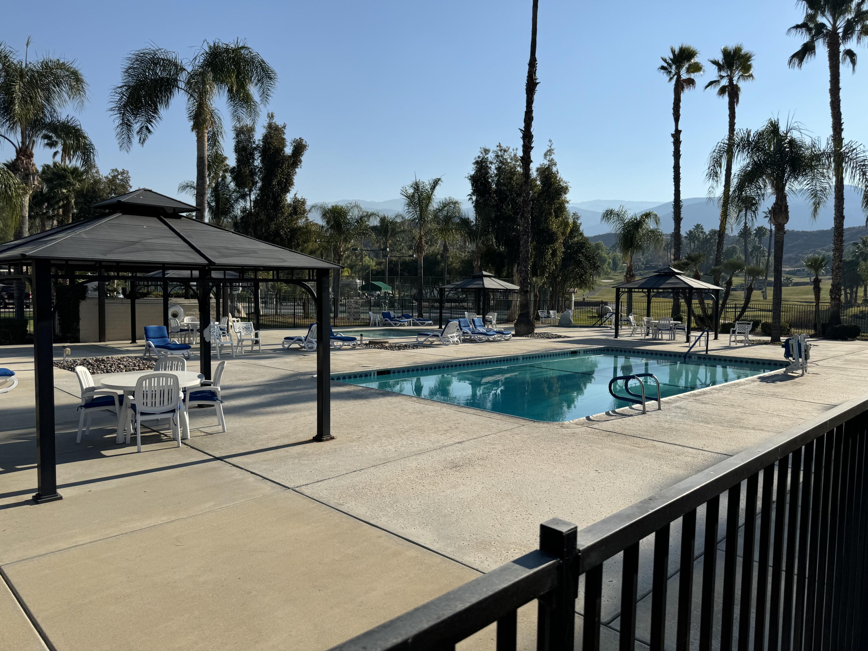 45525 Ca-79 S Temecula, CA 92590 - Photo 17 of 18 a view of a patio with swimming pool