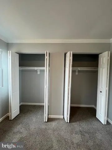 an empty room with closet