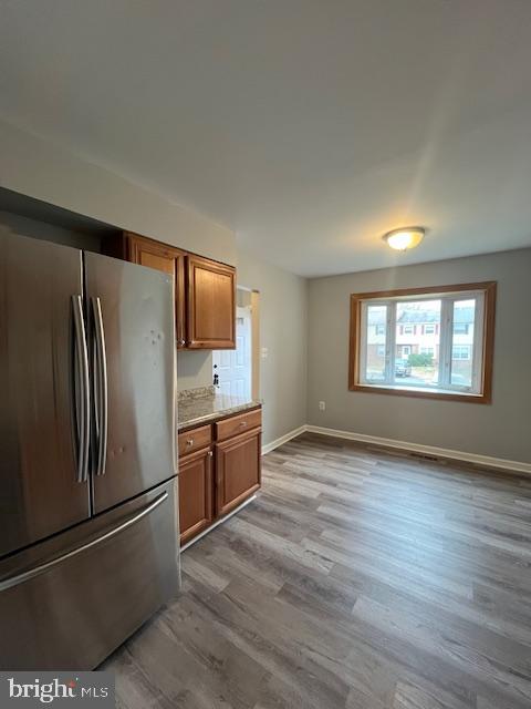 14811 Ensor Court Woodbridge, VA 22193 - Photo 3 of 34 a kitchen with stainless steel appliances granite countertop a refrigerator and a stove top oven
