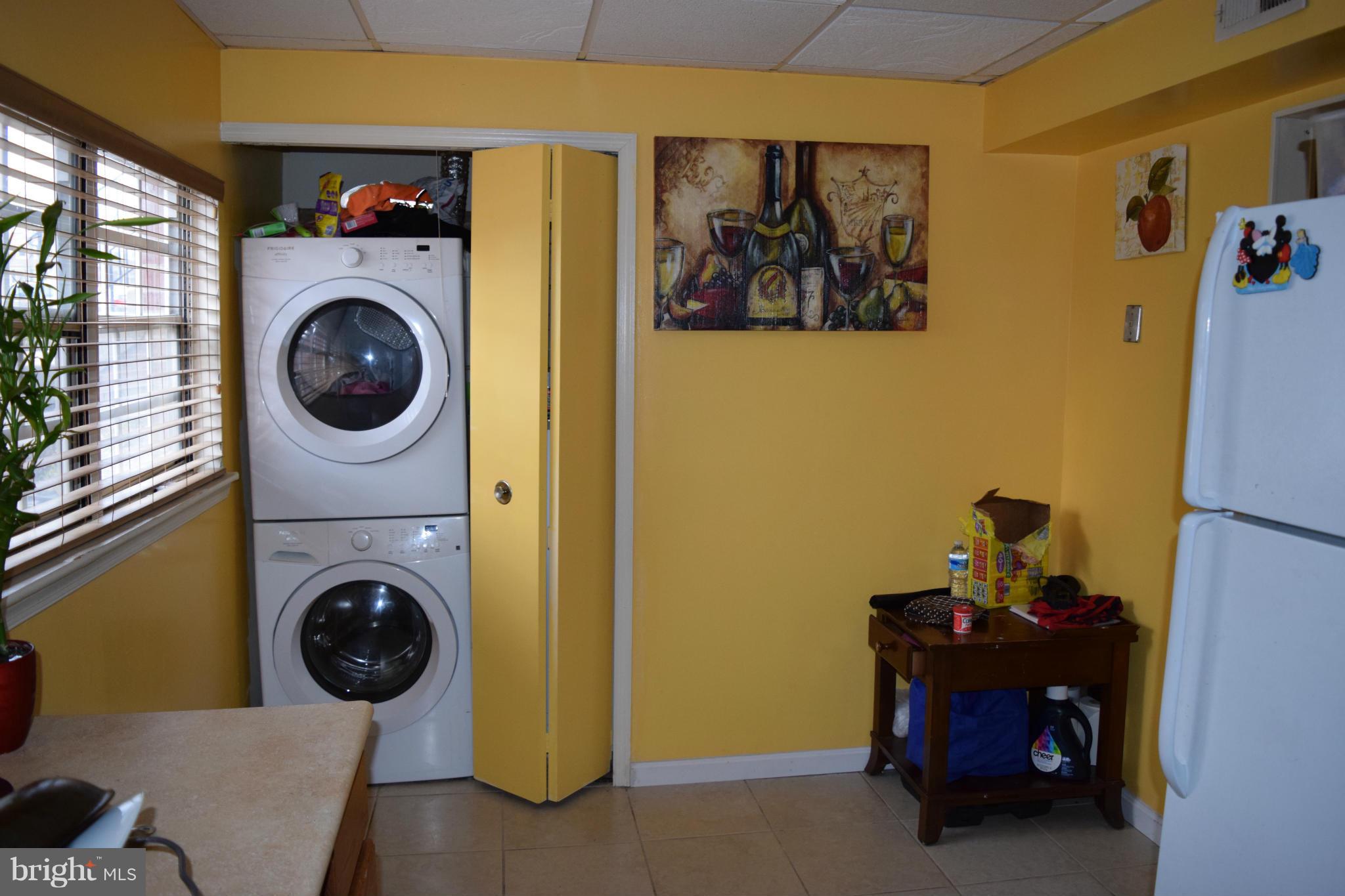 3436 Bruton Parish Way, Unit 25 Silver Spring, MD 20904 - Photo 4 of 6 a utility room with dryer and washer
