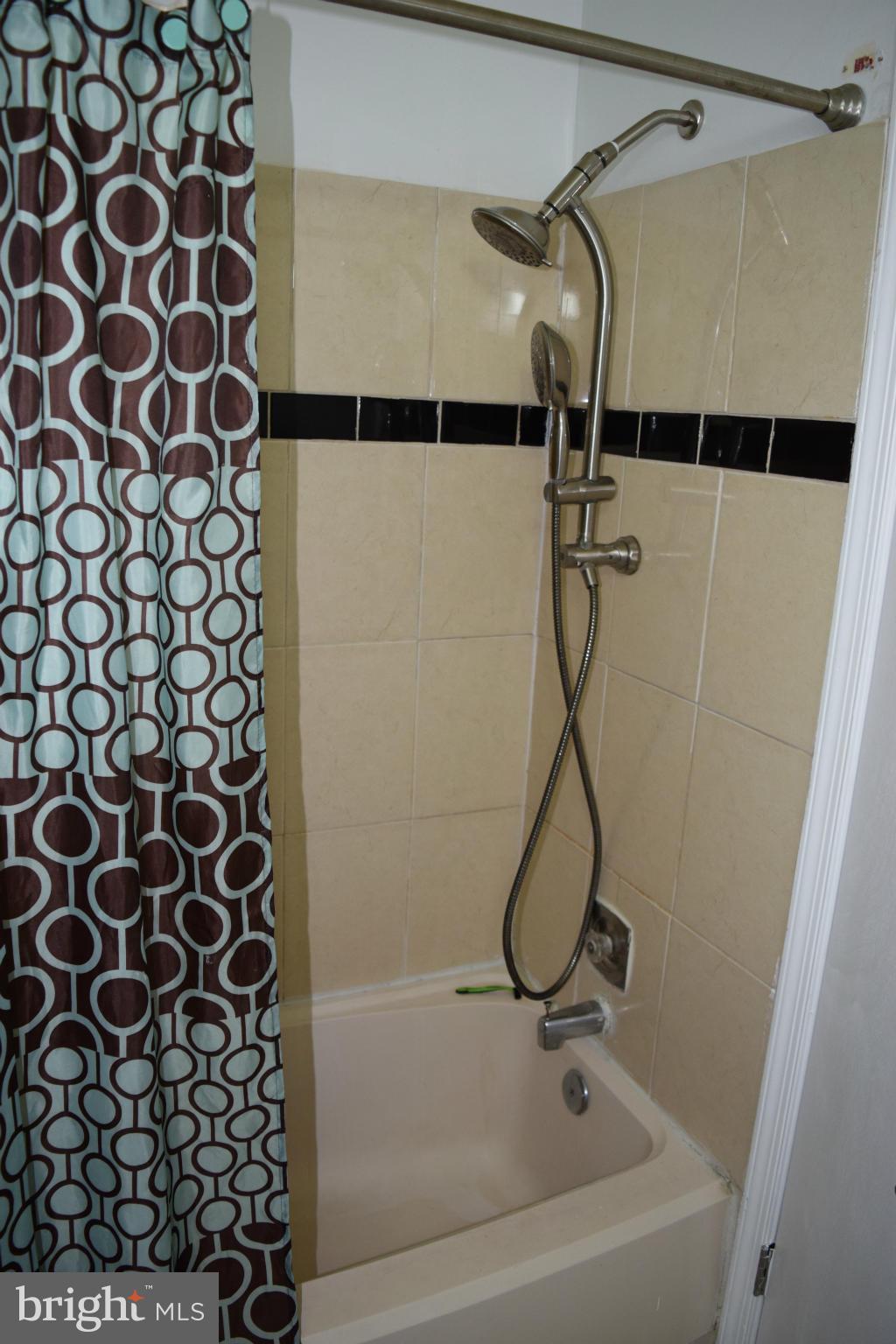 3436 Bruton Parish Way, Unit 25 Silver Spring, MD 20904 - Photo 6 of 6 a bathroom with a shower and a shower