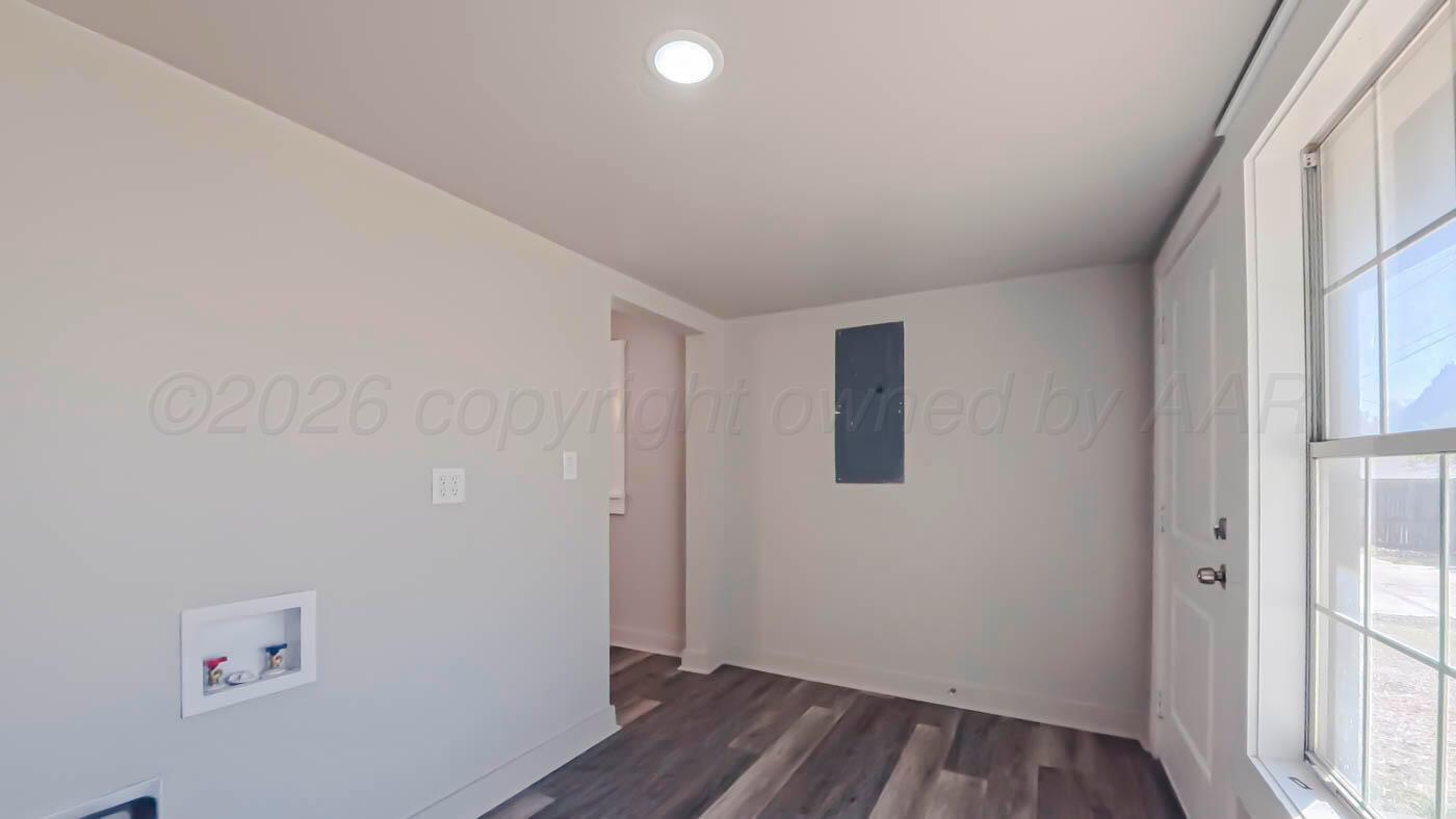 1316 Withers Avenue Amarillo, TX 79108 - Photo 7 of 19 a view of a hallway with closet area
