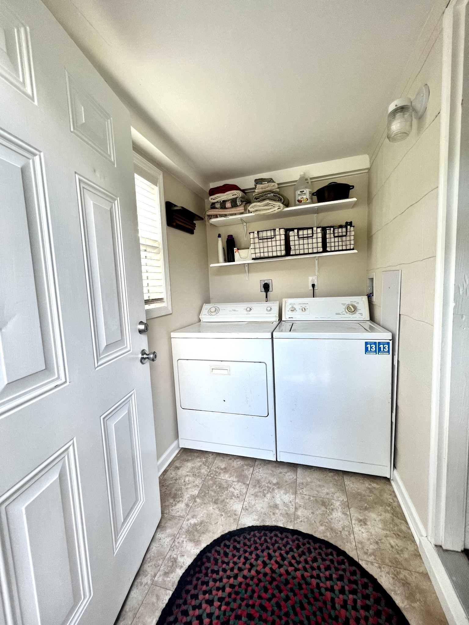 639 Neelys Bend Road Madison, TN 37115 - Photo 12 of 16 a utility room with dryer and washer