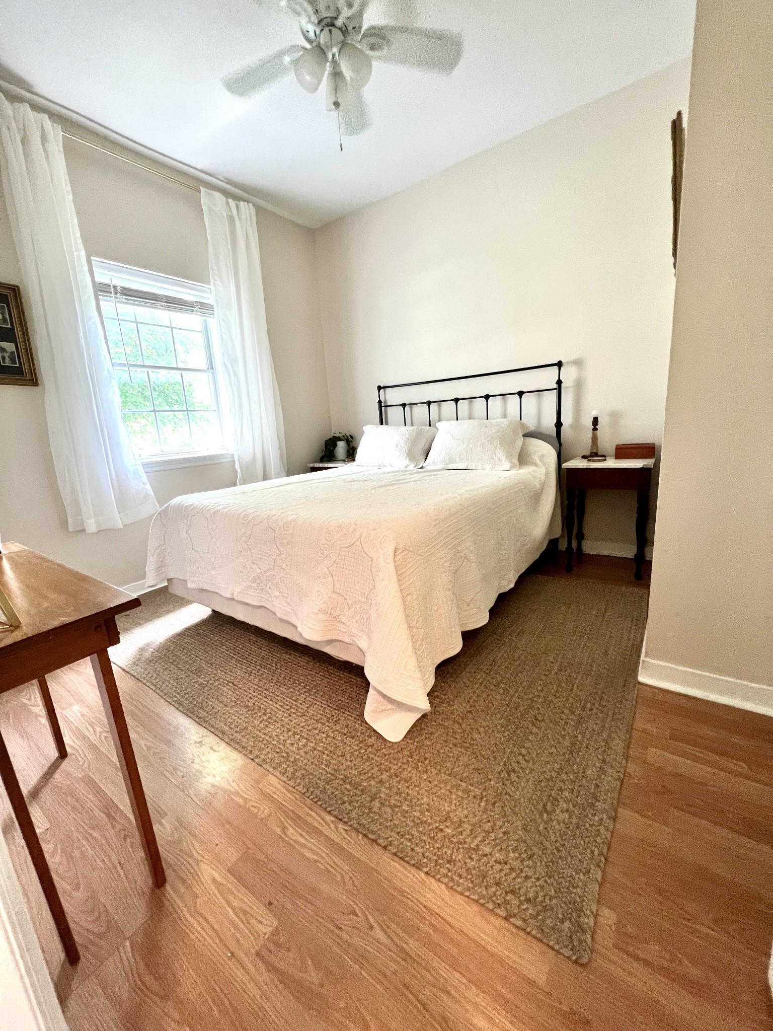 639 Neelys Bend Road Madison, TN 37115 - Photo 6 of 16 a bedroom with a bed and window