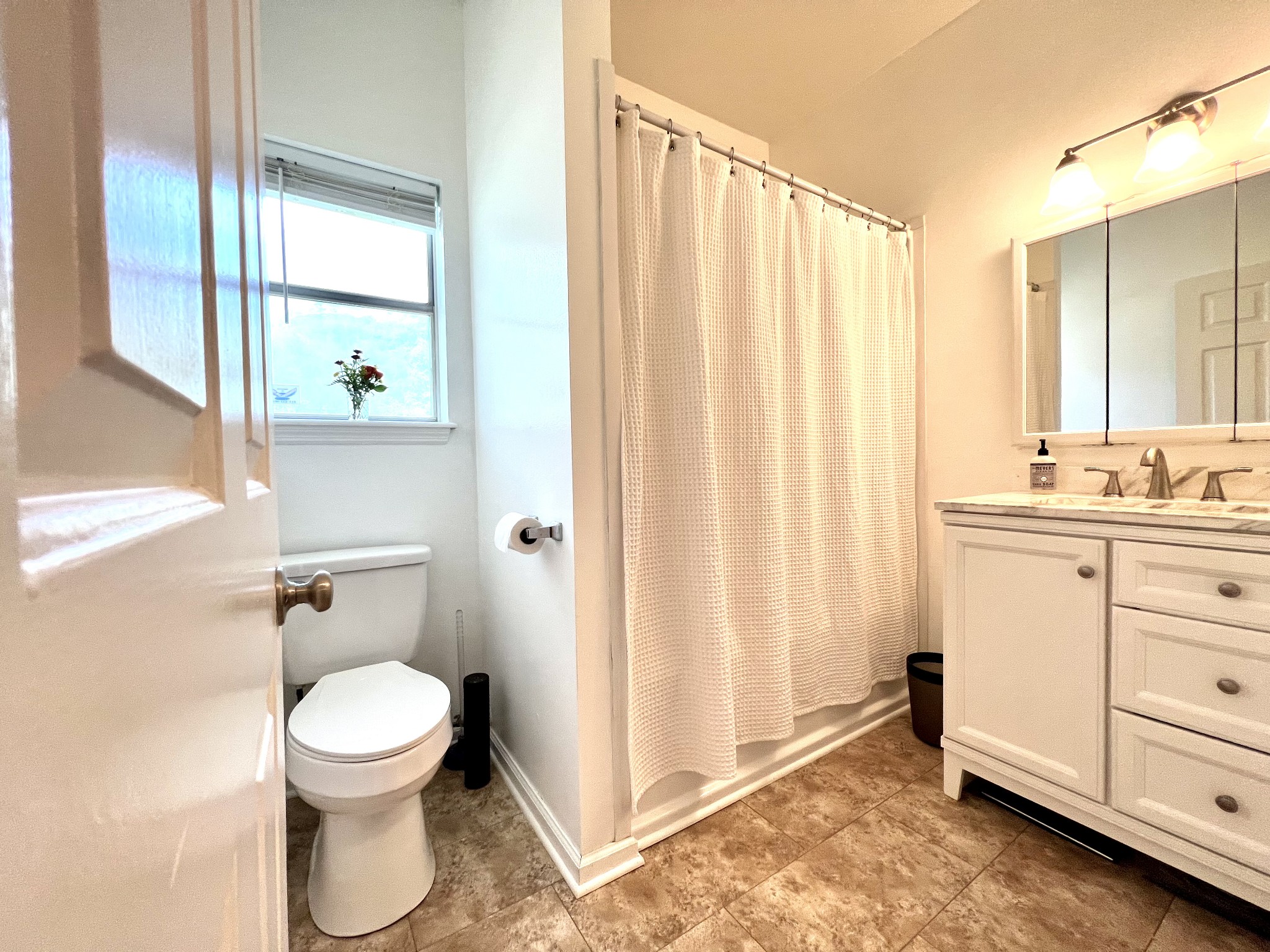 639 Neelys Bend Road Madison, TN 37115 - Photo 8 of 16 a bathroom with a sink a toilet and shower