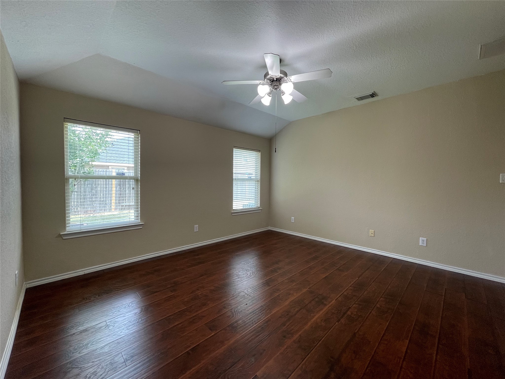 6110 Moran Crest Drive Spring, TX 77388 - Photo 33 of 49 a view of an empty room with wooden floor and a window
