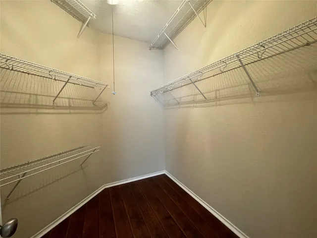 a view of a room with racks on the wall
