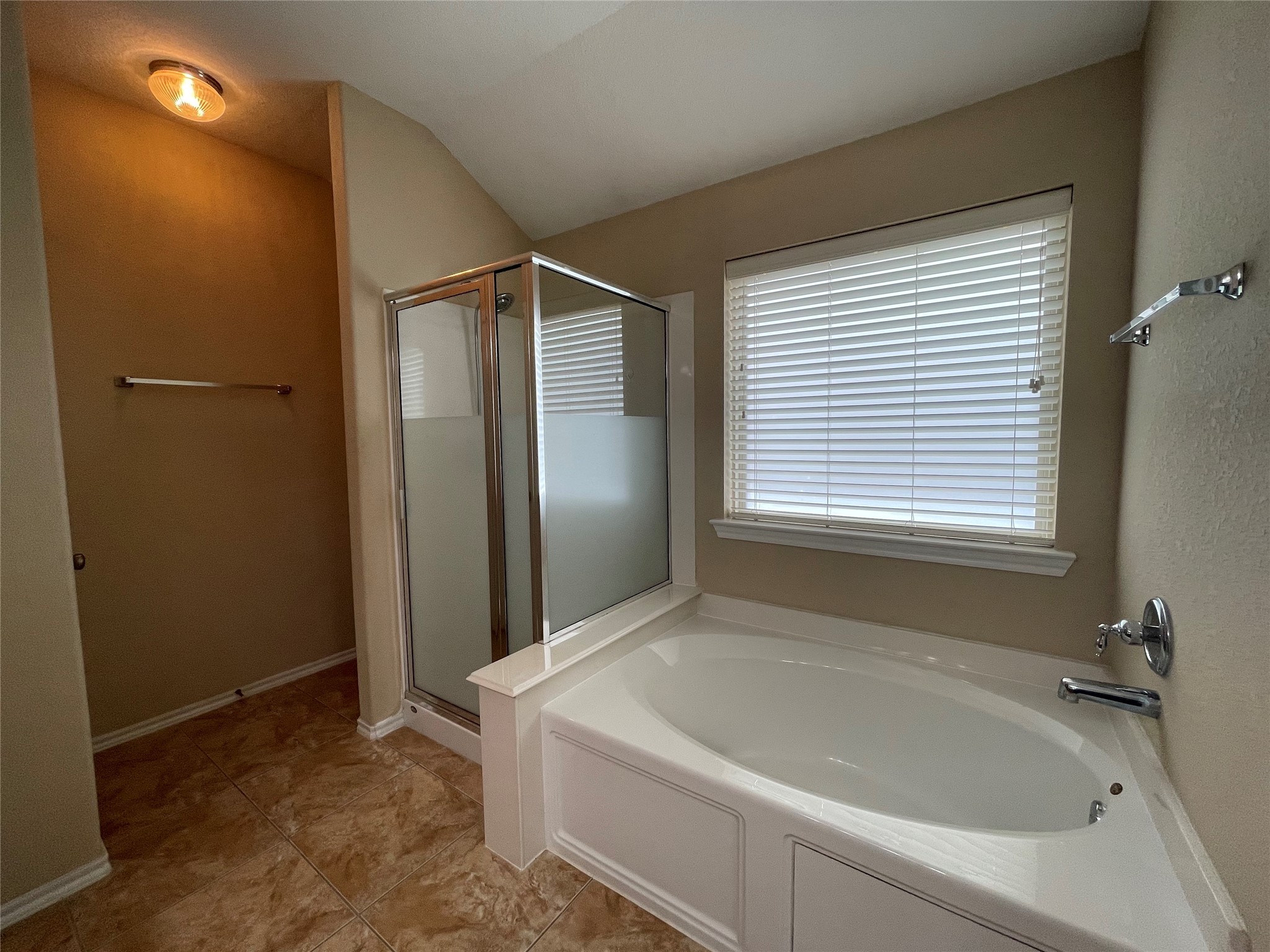 6110 Moran Crest Drive Spring, TX 77388 - Photo 41 of 49 a bathroom with a bathtub and a shower