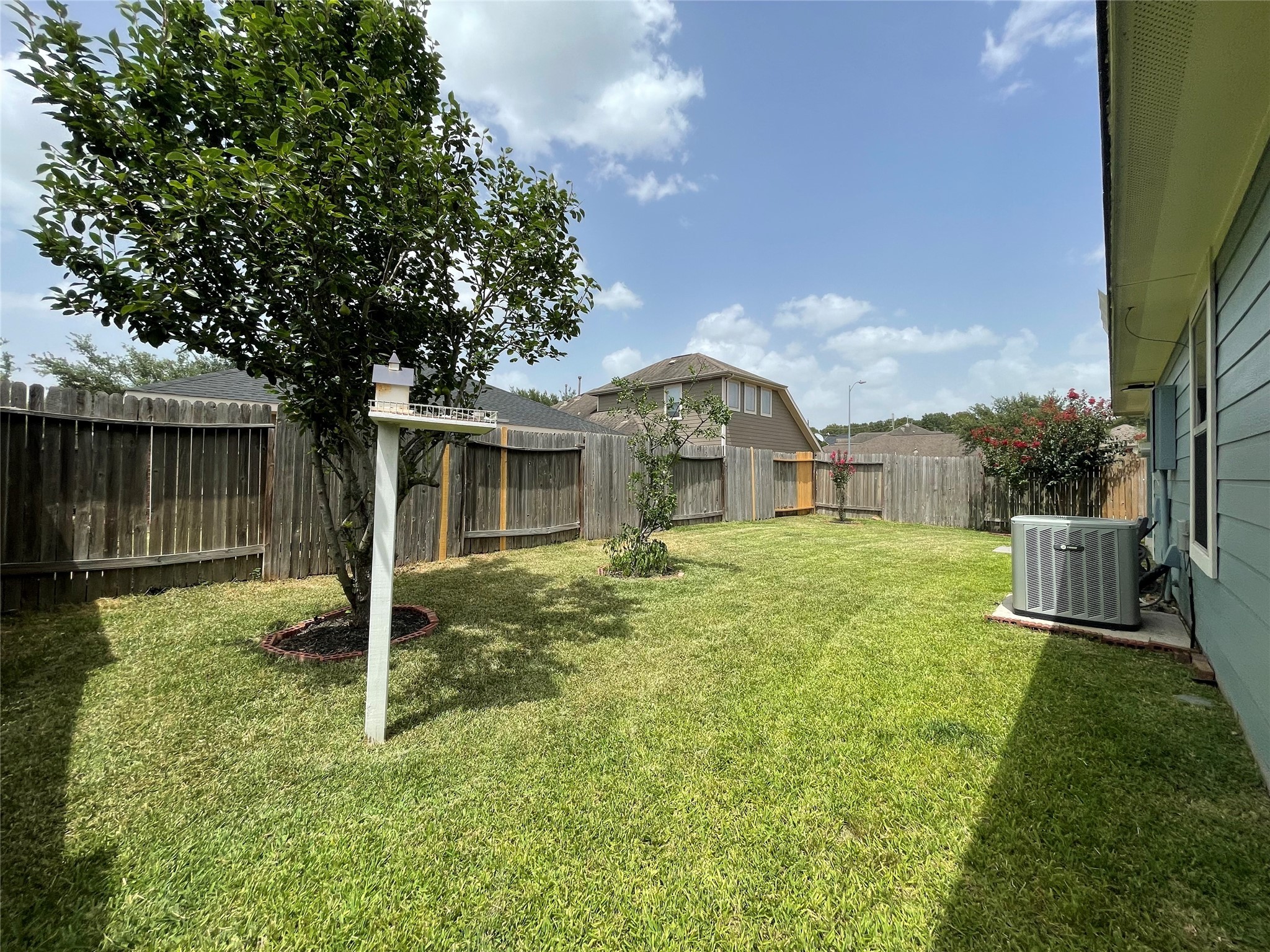 6110 Moran Crest Drive Spring, TX 77388 - Photo 47 of 49 a front view of a house with a yard