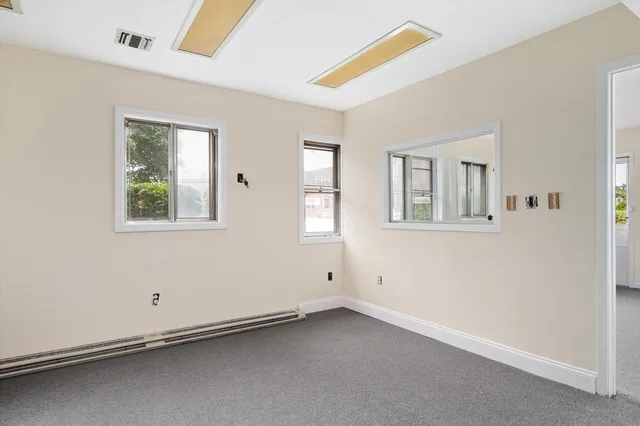 an empty room with windows