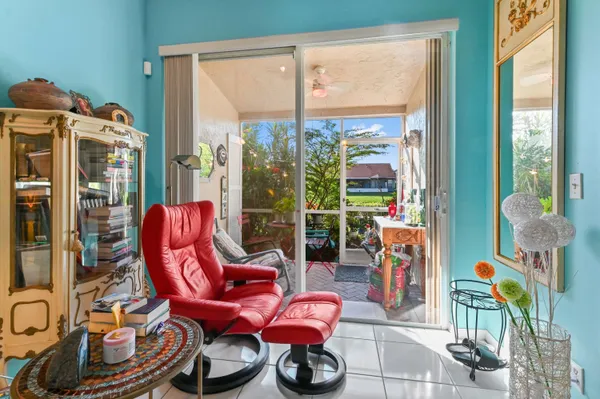 a room with lots of furniture and windows