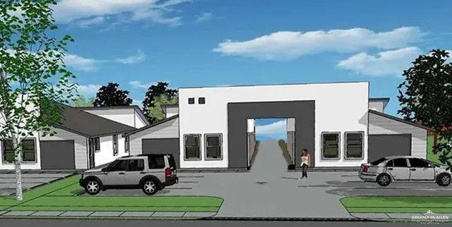 a view of a house with a yard