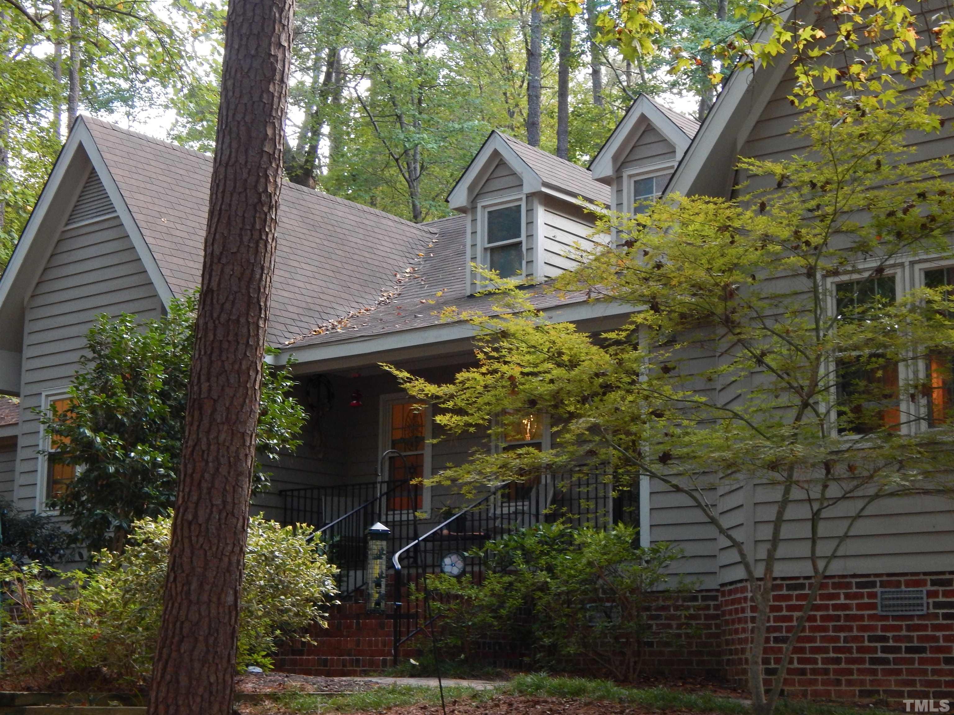 2003 Parliament Place Apex, NC 27502 - Photo 2 of 24 aerial view of a house with a yard and potted plants