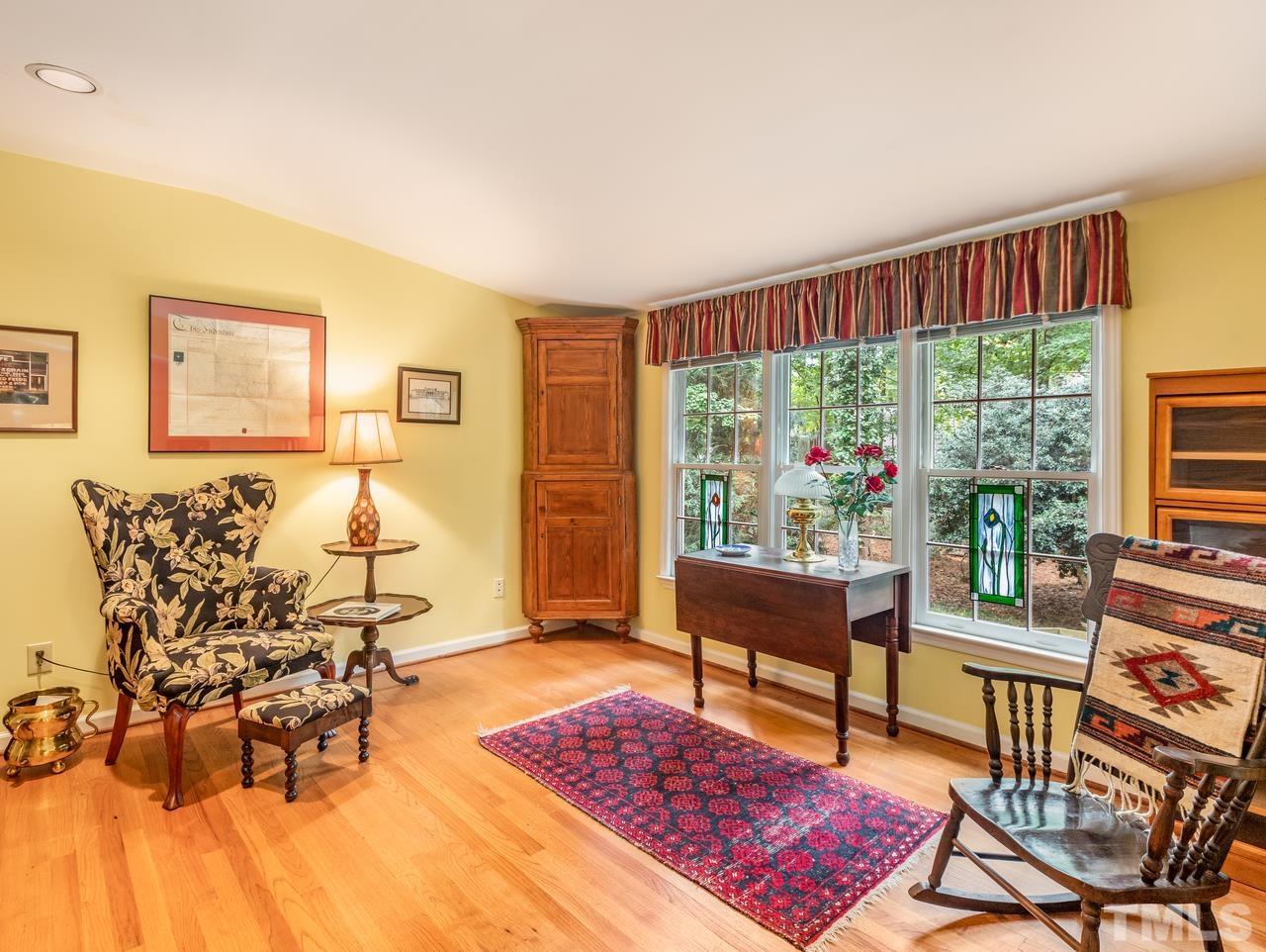 2003 Parliament Place Apex, NC 27502 - Photo 23 of 24 a living room with furniture and a large window