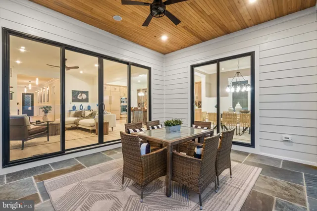 a work room with furniture and a window