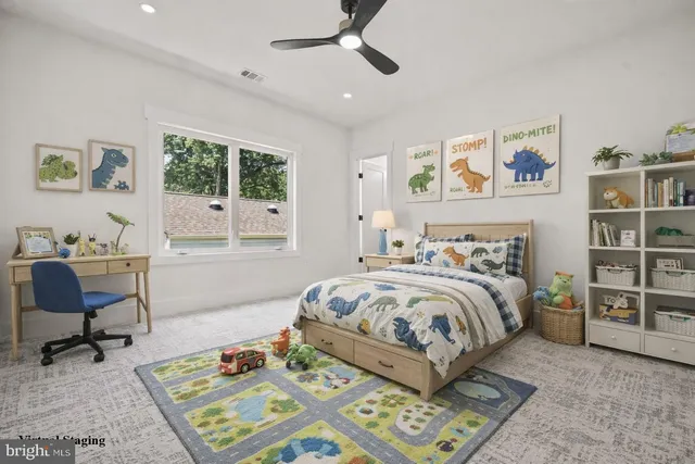 a bed room with a bed and a window