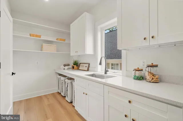 a bedroom with a bed and a painting