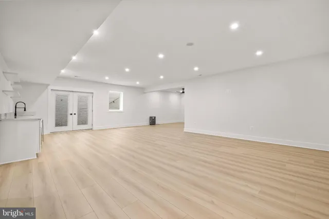 a dining room with furniture and garden view