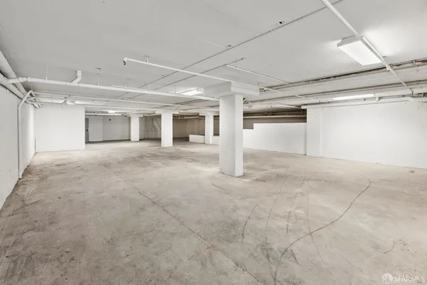 a view of a room with stainless steel appliances