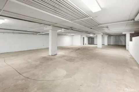 a view of a hallway with a white walls