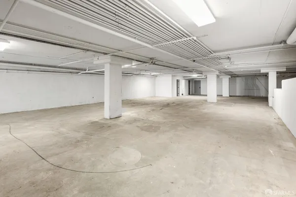 a view of a hallway with a white walls