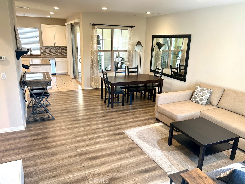 104 Briarberry Irvine, CA 92618 - Photo 12 of 27 a living room with furniture and a table
