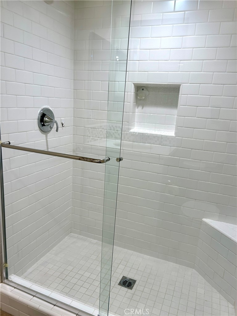 104 Briarberry Irvine, CA 92618 - Photo 6 of 27 a bathroom with a shower