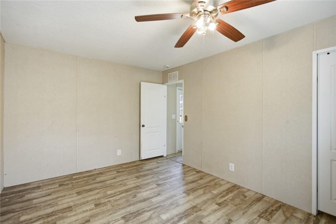 289 Bauknight Road Mountain Rest, SC 29664 - Photo 18 of 36 This spacious bedroom offers ample natural light and a practical layout for comfortable living.
