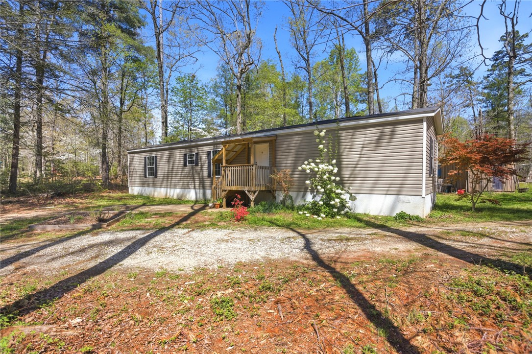 289 Bauknight Road Mountain Rest, SC 29664 - Photo 2 of 36 This tranquil woodland retreat offers a private setting, perfect for peaceful living.