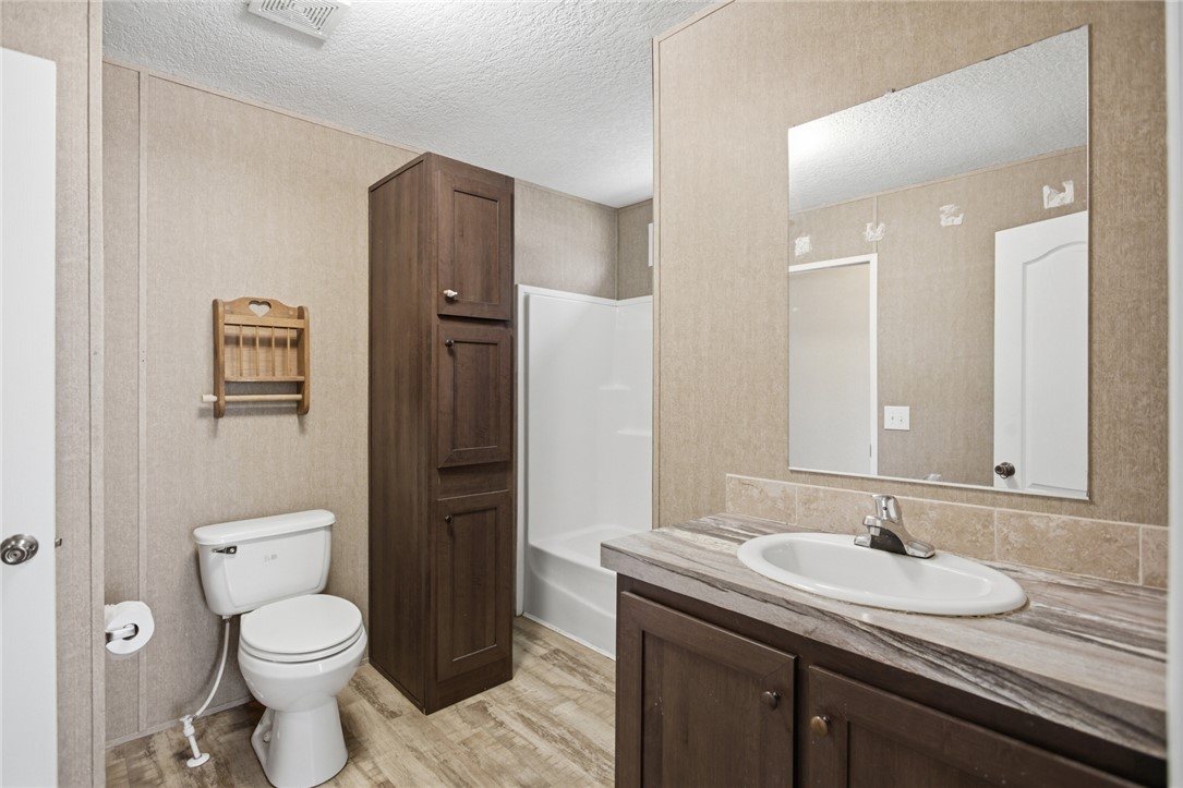 289 Bauknight Road Mountain Rest, SC 29664 - Photo 28 of 36 This bright bathroom features a spacious shower and ample storage.