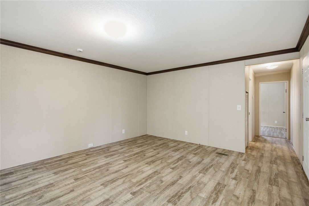 289 Bauknight Road Mountain Rest, SC 29664 - Photo 5 of 36 This versatile living area features durable flooring, offering a comfortable and adaptable space.