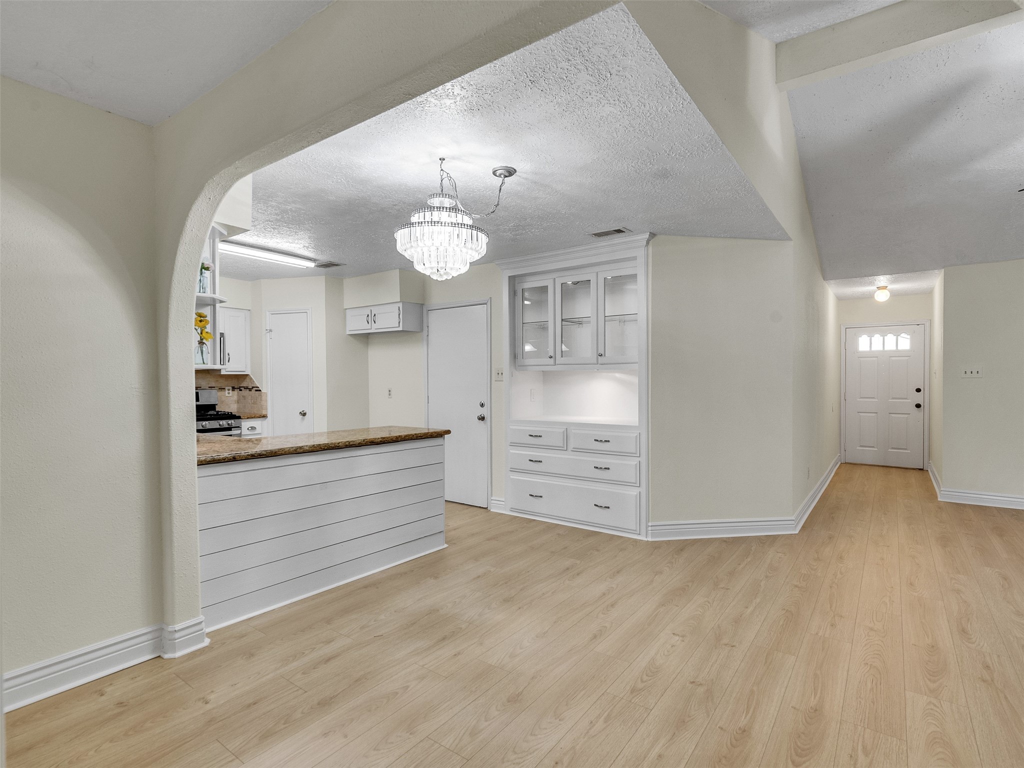 32 Sarita Road Angleton, TX 77515 - Photo 17 of 25 wooden floor with white cabinets