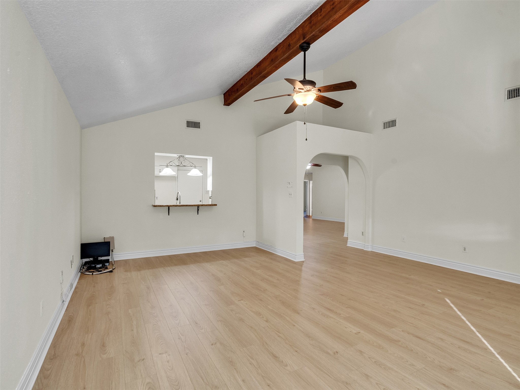 32 Sarita Road Angleton, TX 77515 - Photo 19 of 25 wooden floor in an empty room with a window