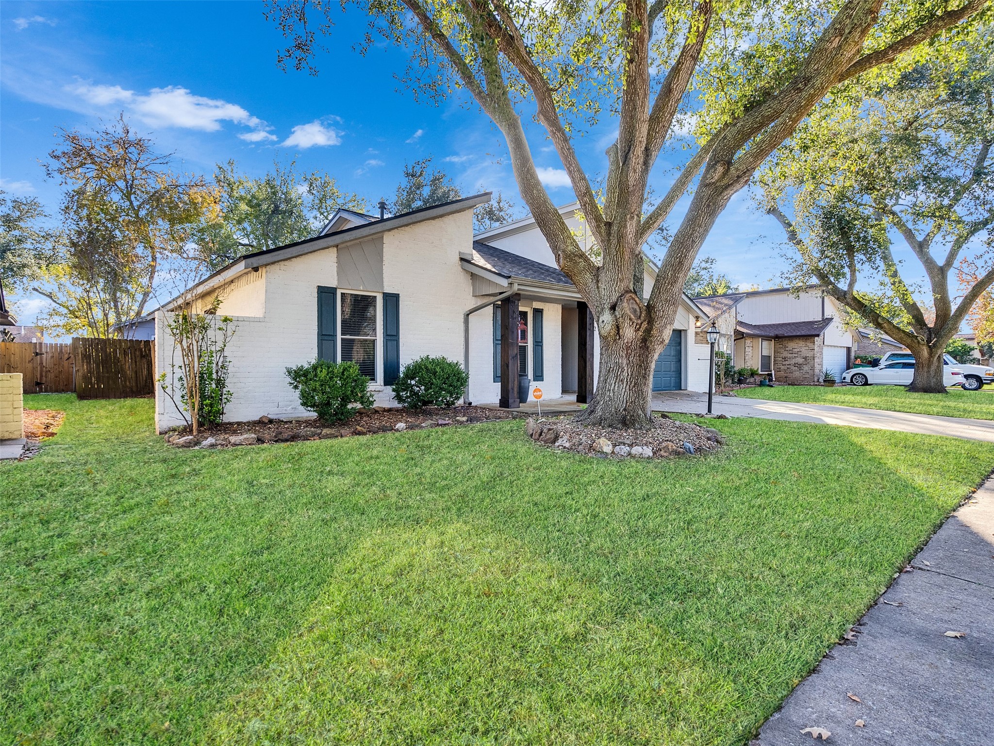32 Sarita Road Angleton, TX 77515 - Photo 2 of 25 a front view of house with yard and green space