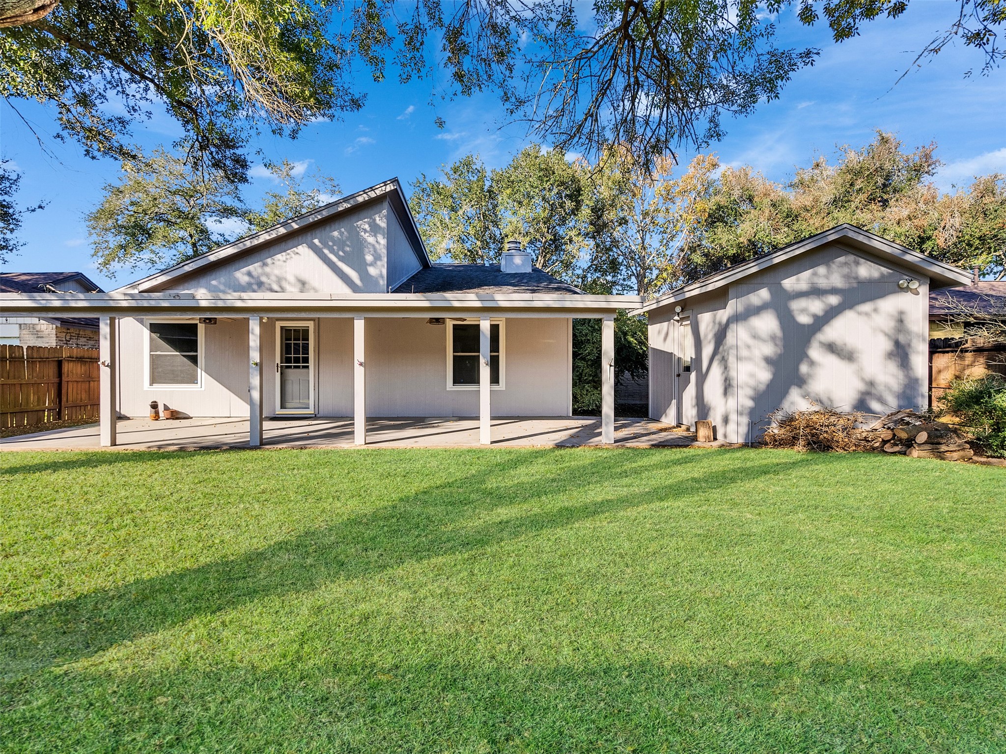32 Sarita Road Angleton, TX 77515 - Photo 24 of 25 a view of a house with a backyard