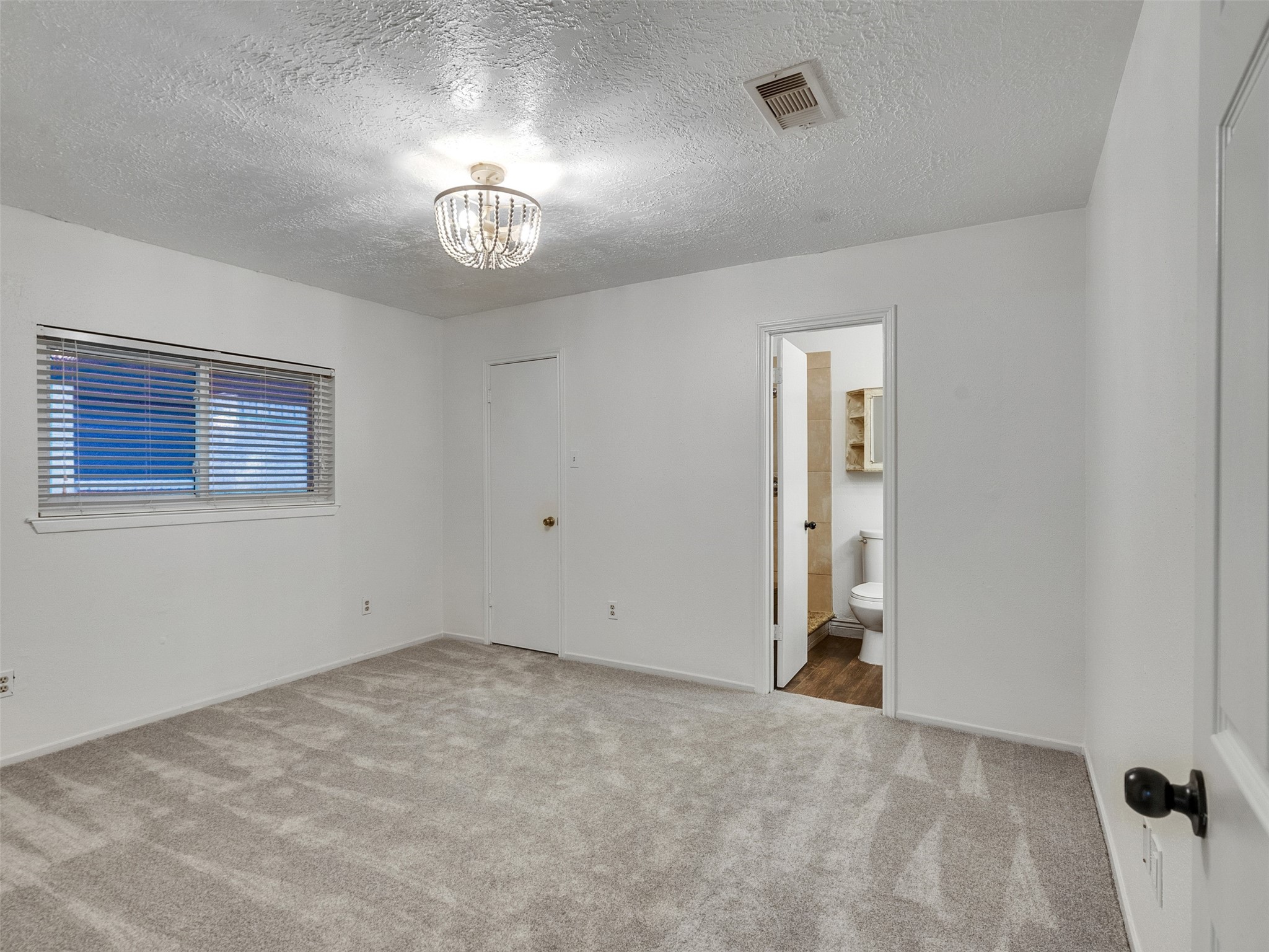 32 Sarita Road Angleton, TX 77515 - Photo 6 of 25 a view of an empty room with a window