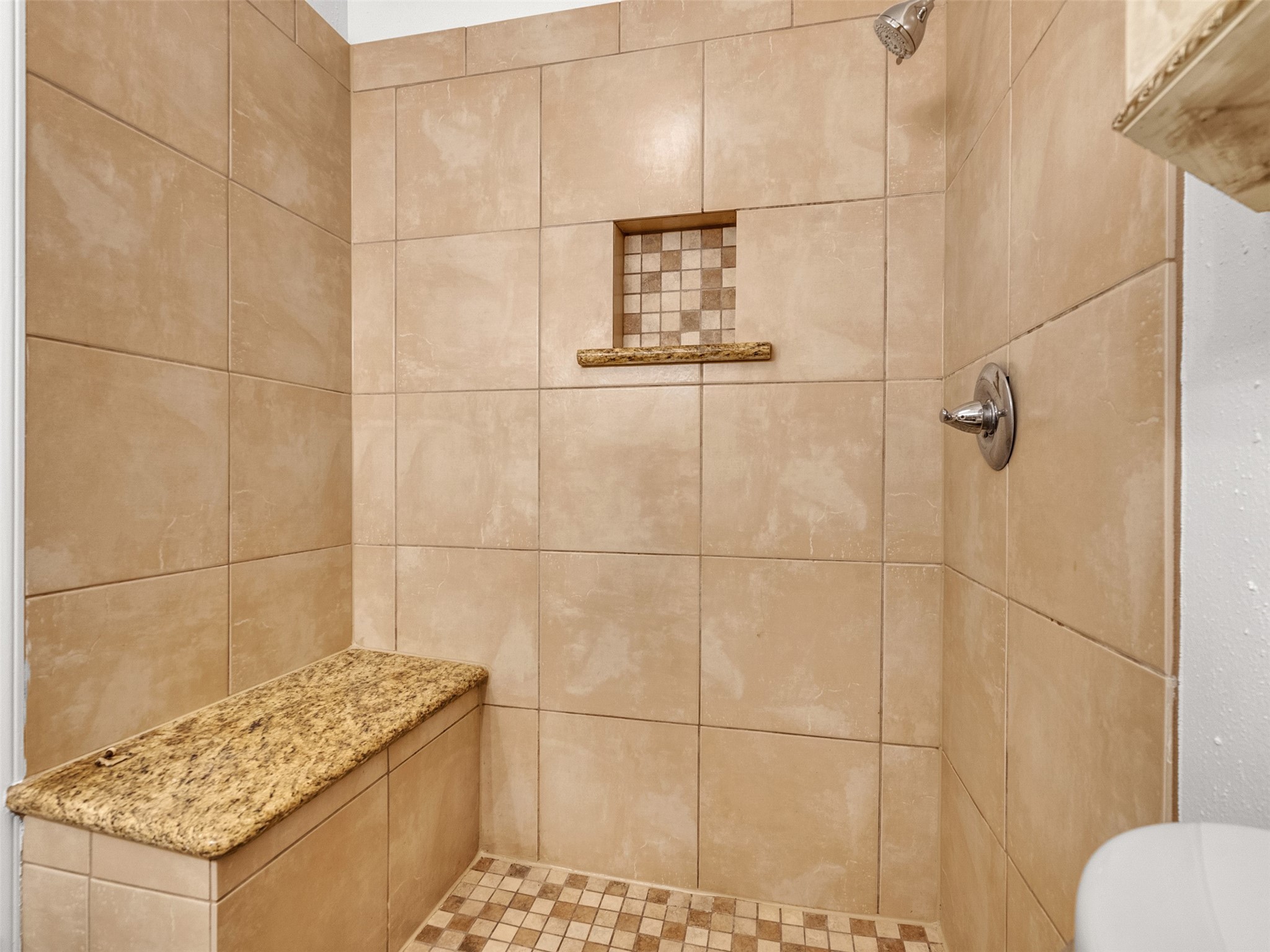 32 Sarita Road Angleton, TX 77515 - Photo 8 of 25 a bathroom with a granite countertop shower and a sink