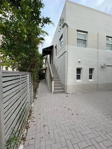 a view of a house with a stairs