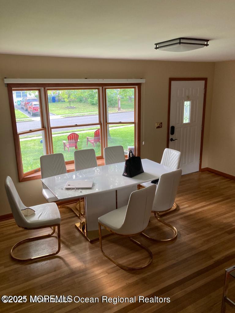 2 Lloyd Place Oakhurst, NJ 07755 - Photo 4 of 4 a workspace with furniture and wooden floor