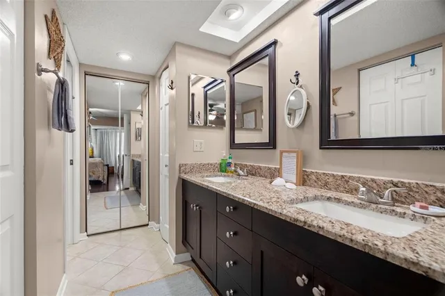 a bathroom with a toilet and a shower curtain