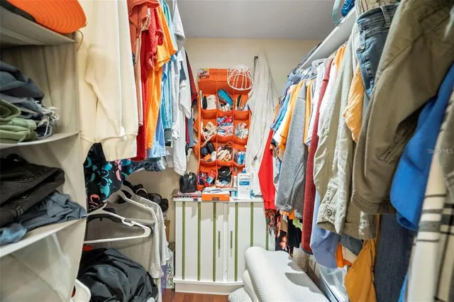a dining room with furniture large windows and glass windows