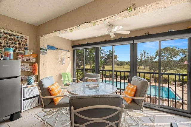 a room with furniture and a large window