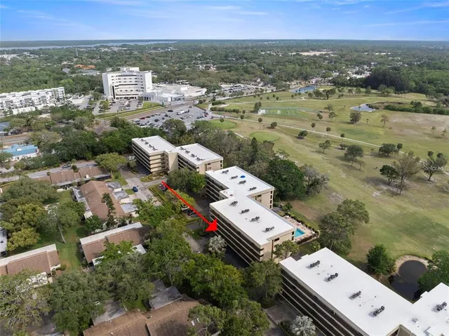view of a pool with a yard