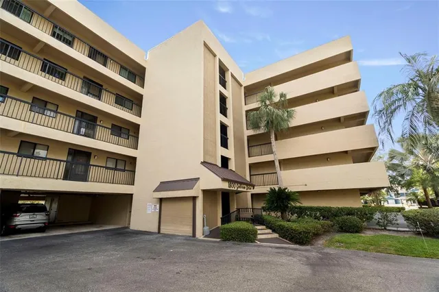 a view of a lake with lots of residential buildings