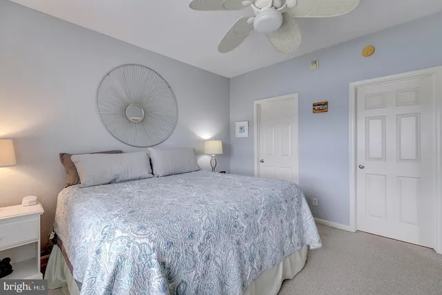 a bathroom with a sink toilet and mirror